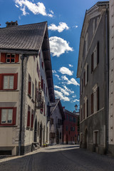 Fototapeta na wymiar Colorful medieval street in Samedan in Engadin