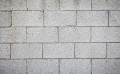 Closeup of big white brick wall authentic background texture