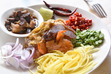 Khao Kluk Kapi (Thai Fried Rice with Shrimp Paste) on the table at street market