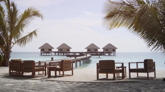 Private Bungalows on a Pier over Water in the Maldives