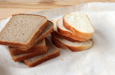 Sliced bread and a loaf