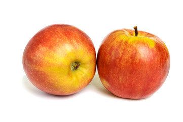 Fototapeta na wymiar Two ripe ruddy red-yellow apple isolated on white background.