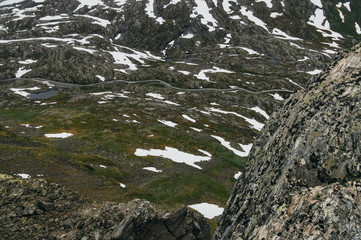 Road through lifeless tundra landscape