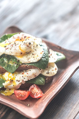 Sandwich with poached eggs