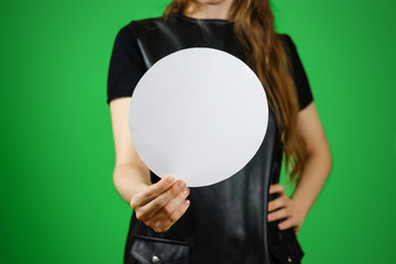 Woman showing blank white rounded flyer brochure booklet. Leaflet presentation. Pamphlet hold...
