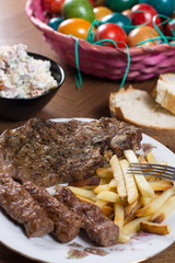 Served lunch on the table with meat and Easter eggs