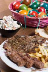 Served lunch on the table with meat and Easter eggs