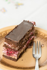 Fruit cake with chocolate served on the plate