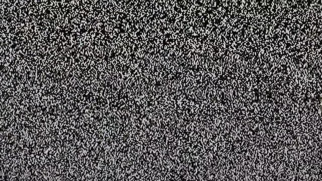 Static noise of flickering detuned TV screen