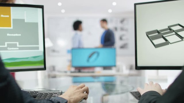  New worker at technology design company shakes hands with the boss