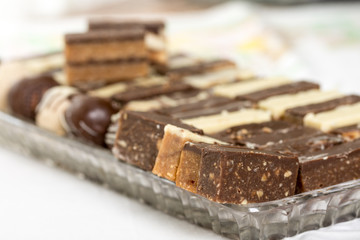 Chocolate cookies served on the plate with blurred background