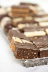 Chocolate cookies served on the plate with blurred background