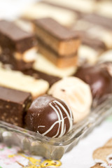 Chocolate cookies served on the plate with blurred background