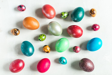 Fototapeta na wymiar Dyed eggs on white background