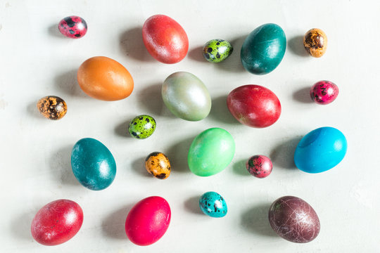 Dyed eggs on white background