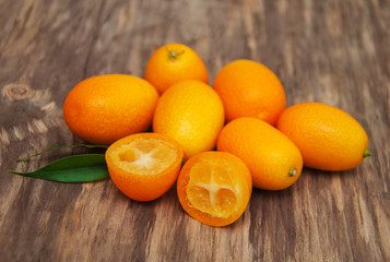 Kumquats on a wooden table
