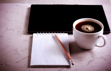 Work desk table with tablet, notepad