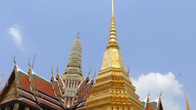 Tilt up of Wat Phra Kaew temple (Royal Grand Palace) in Bangkok, Thailand.