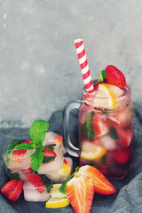 Fresh homemade ice cubes with fruits. Summer fresh drink