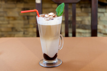 Cup of coffee latte with whipped cream