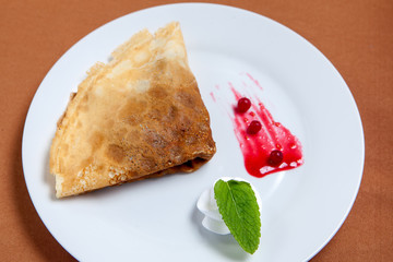 Sweet pancake with fruit filling