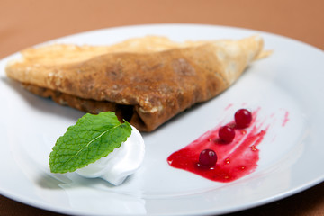 Sweet pancake with fruit filling