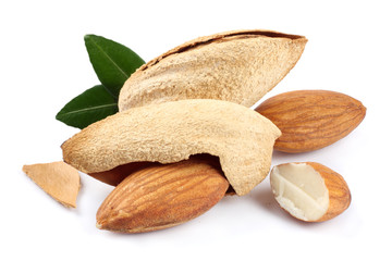 almond isolated on white background. with green leaf 