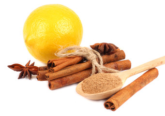 cinnamon with lemon isolated on white background