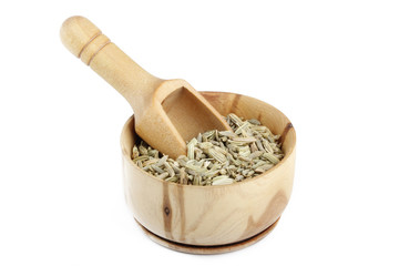 fennel in wooden cup isolated on white background