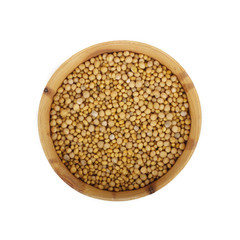 seed of mustard in wooden cup isolated