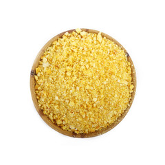 ground dried rind of orange in wooden cup isolated