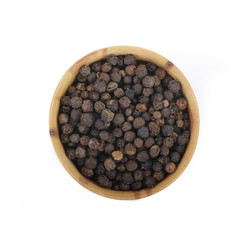 black peppercorn in wooden cup  isolated