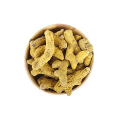 turmeric in wooden cup isolated