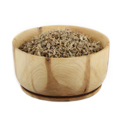 anise in wooden cup isolated