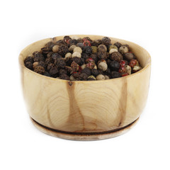 set of peppercorn in wooden cup isolated