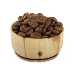 caffee corns in wooden cup isolated