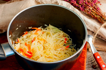 Sour cabbage and onions for soup, selective focus