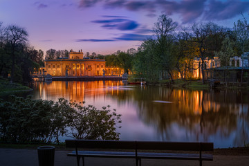 Łazienki Królewskie, Pałac na Wyspie. An evening view of a Neoclassicist palace in Warsaw. - 144709129
