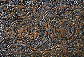 carving on the lid of a wooden box