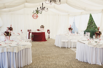 Beautiful Banquet hall under a tent for a wedding reception.
