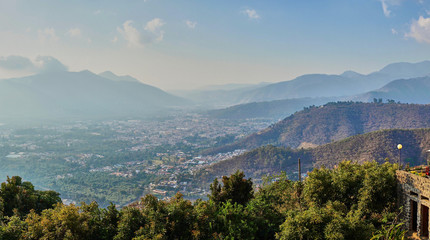 Foggy volcanic land of Guatemala / Antigua City from above