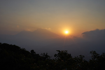 Sunset in volcanic highlands of Guatemala / Evening hours on volcano trekking tour next to Antigua in Guatemala 