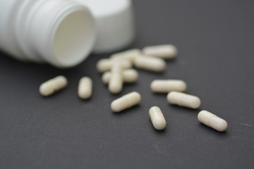 Pills on a black background