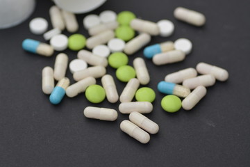 Pills on a black background