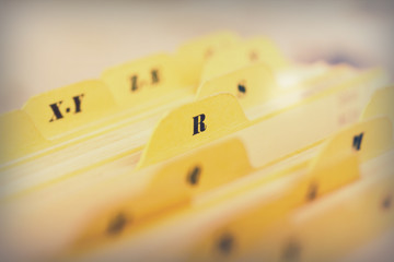 Close up of alphabetical index cards in box