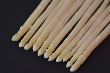 Asparagus against a black background