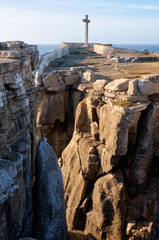 Cross on the coast of Atlantic Ocean at Cruz dos Remedios, Peniche, Portugal