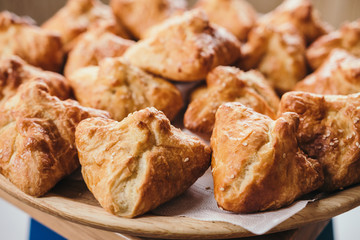 Crispy cheese puff pastries with seeds. Close up