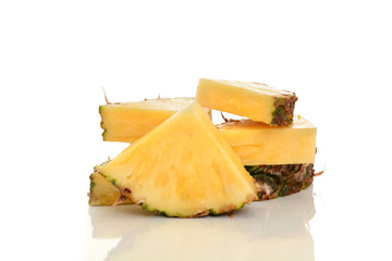 slices of pineapple on a white background