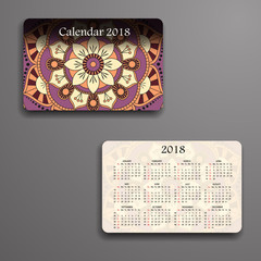 Vector calendar 2018 with decorative elements. Vector mandala design. Template can be used for web and print design.